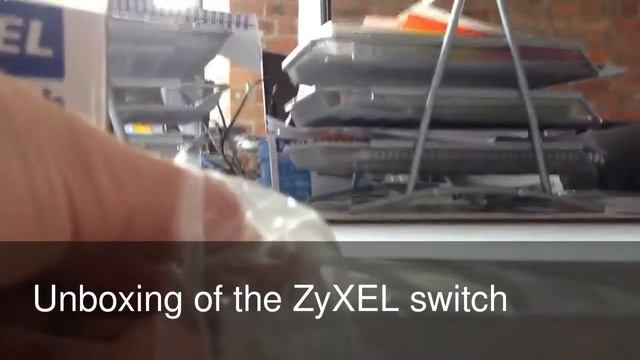 Unboxing of the ZyXEL 8 port switch смотреть онлайн