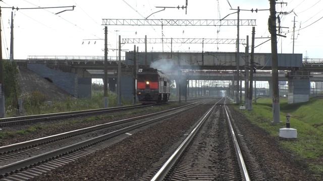 Электропоезд ЭТ2-001 и тепловоз 2ТЭ116-1199 смотреть онлайн