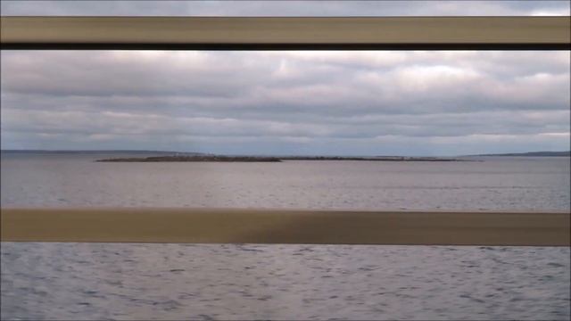 Driving over Öland Bridge connecting Kalmar (mainland Sweden) to Färjestaden on the island of Öland смотреть онлайн