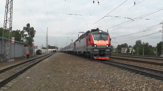 Электровоз ЭП20-034 с фирменным поездом "Янтарь" смотреть онлайн