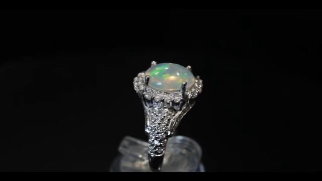 Серебряное кольцо с опалом и кубическим цирконием. смотреть онлайн
