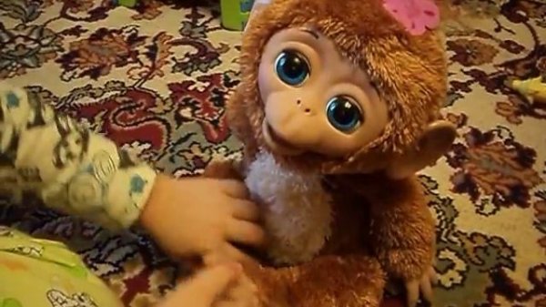 Обезьянка игрушка ( электронная )