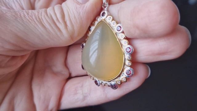 Серебряный кулон с 50-каратным опалом смотреть онлайн