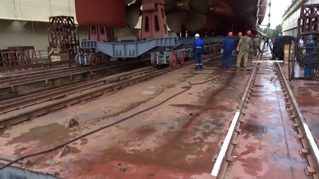 Расплющенная монета на память о спуске СКР Адмирал Макаров смотреть онлайн