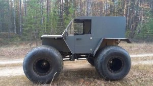 Болотоход на шинах трэкол по весеннему болоту