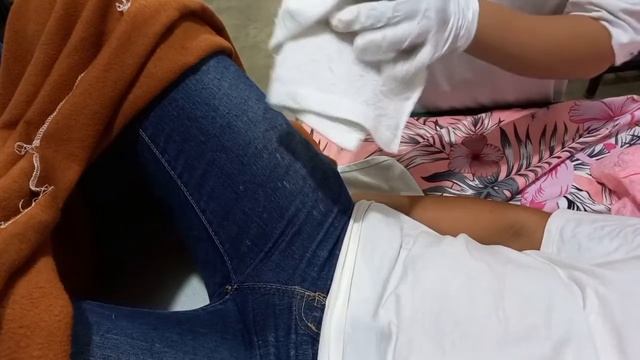 Diaper Aplication On A Lying Down Person