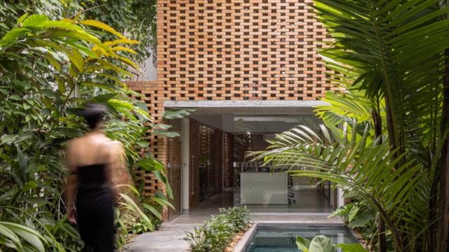 Contemporary Office Design Surrounded With Green Trees And Vines Covering The Walls