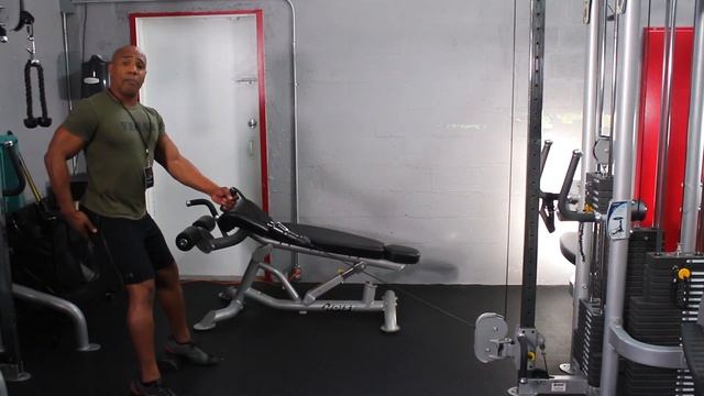 HOW TO DO SQUAT AND SINGLE ARM ROW WITH HALF ROLLERS HEELS ON TOP