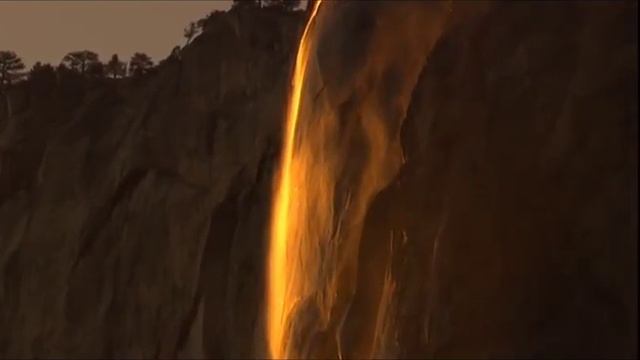 Fire flakes flow at Horsetail Falls смотреть онлайн