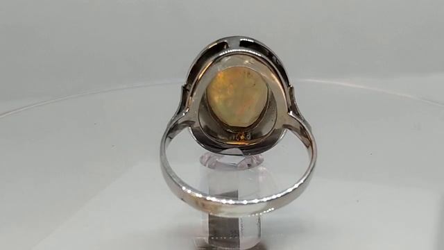 Авторское серебряное кольцо ручной работы с эфиопским 3D опалом Арлекин 2.80ct (14х9мм) смотреть онлайн