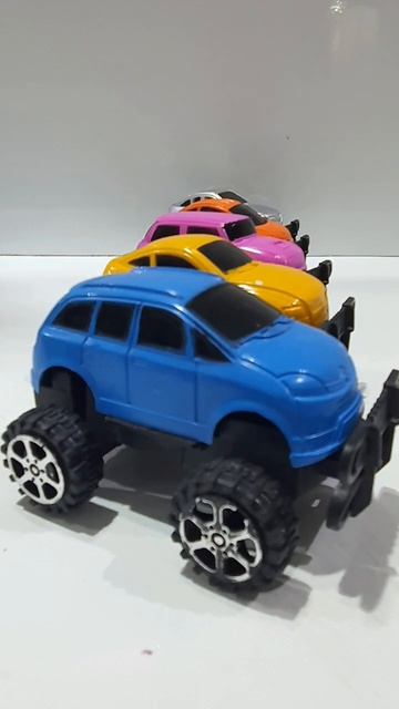 Mini cars line up for showcasing #minicar #vw #beetle #bmw #mitsubishi #bigwheels смотреть онлайн