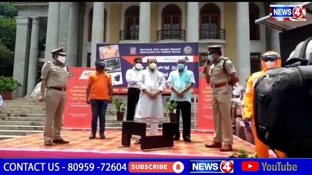 Karnataka Home Minister Basavaraj Bommai & ACT Fiber Distributed Rain Coat To Bangalore Traffic Pol
