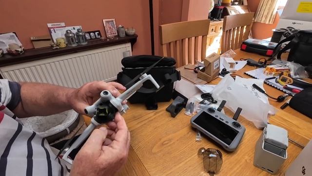DJI mini 4 Pro Fly more Combo unboxing and update Normal UK drone pilot смотреть онлайн