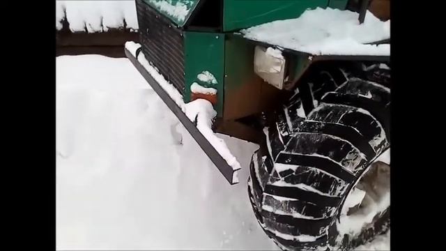 По катушки по снегу