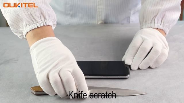 OUKITEL K4000 Plus meets screen challenge-crack walnuts, knife scratch and knock nails into wood смотреть онлайн