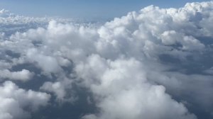 Там за облаками.