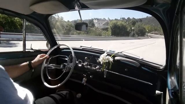 Driving Sea Blue 1964 VW Beetle Sedan