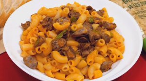 Макароны с куриными сердечками в томатном соусе