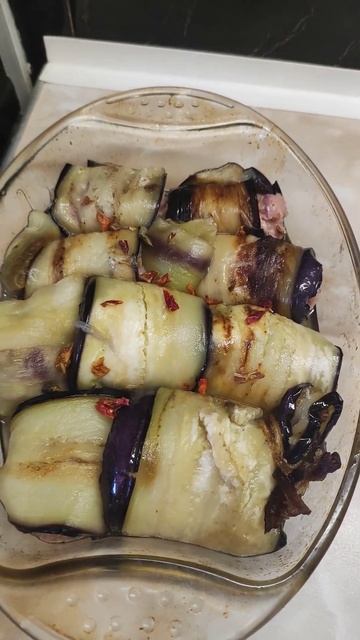 Говорят что это - мусака)), а у меня просто баклажаны с фаршем запечённые в духовке)).