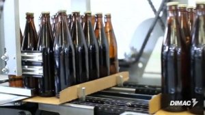 Групповая упаковка стеклянных бутылок в термоусадочную плёнку и лоток на DIMAC STAR ONE