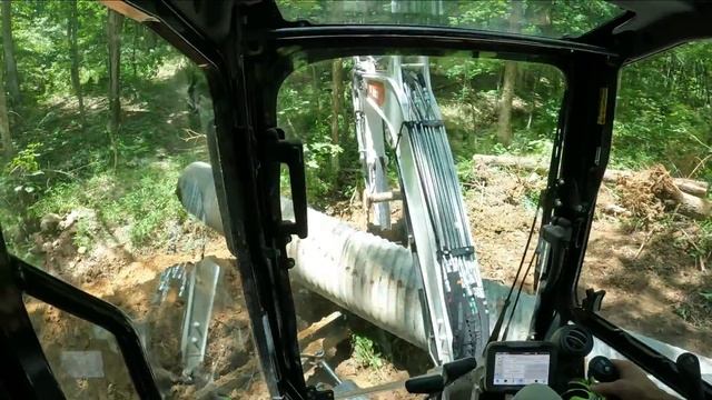 Cutting a new road through the woods & installing a 20 foot culvert pipe across washed out ditch смотреть онлайн