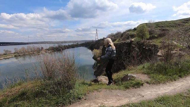 In Outdoor: Shiny Puffer, Leather Leggings And High Heels Boots.
