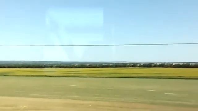 Вид из окна второго этажа вагона поезда №28/27 "Таврия"Москва-Симферополь, 5 августа 2020 г. смотреть онлайн