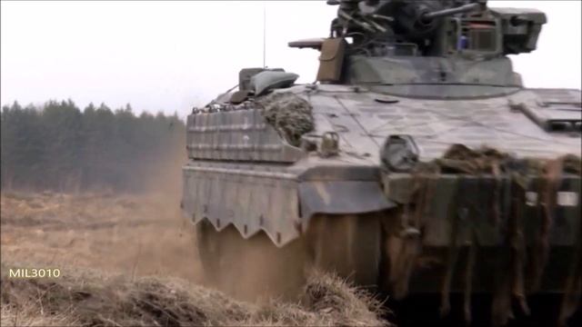 German Army, NATO. Powerful Leopard 2A6 Tanks And Infantry Fighting Vehicles In Lithuania.