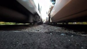 Amtrak Train Races CSX Train Knocks Over Cameras