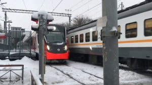 Электропоезда ЭП2Д-0148 ЦППК и ЭГ2Тв-024 «Иволга» платформа Трикотажная