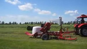 Работа обмотчика рулонов Z593 с рулоно захватчиком