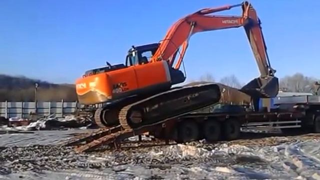 Погрузка экскаватора на трал