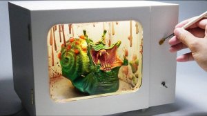 Улитка хищник в микроволновке из полимерной глины.