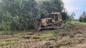 Т-130 с корчевателем.