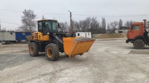Работа фронтального погрузчика BIZON 933 на РБУ