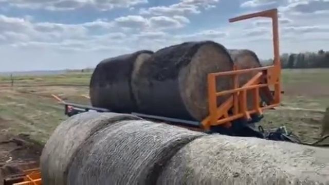 Подборщик-транспортировщик рулонов TRB10L загрузка рулонов из линии смотреть онлайн