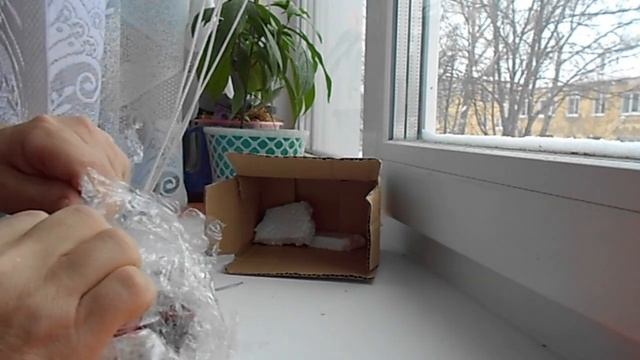 посылка из Китая с Али Экспресс. модель трактора 1:43 Lindner Geotrac 100 смотреть онлайн