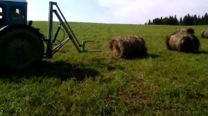 Самодельный погрузчик рулонов на Т-40 в работе.Часть 1.