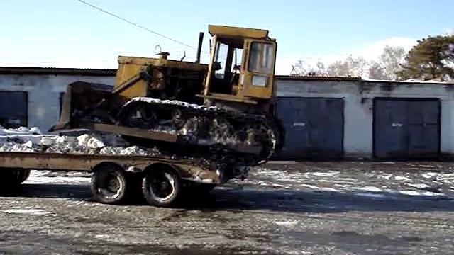 разгрузка бульдозера.MPG смотреть онлайн