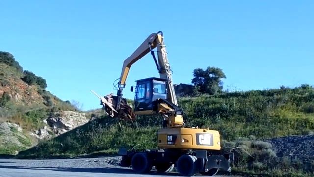 Cat M322D MH Колесный перегружатель смотреть онлайн