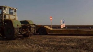 Т150К(ЯМЗ-236) заводит с буксира Т-130.mp4