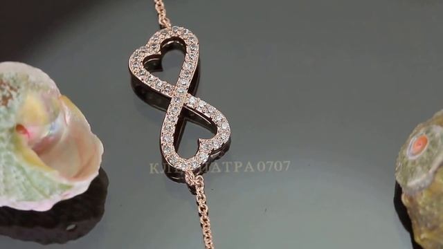Утонченный браслет с кристаллами Swarovski, покрытый слоями золота смотреть онлайн