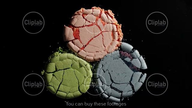 Crush The Colorful Macarons On A Black Background