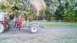 Т-25 с самодельным  погрузчикам - манипулятором