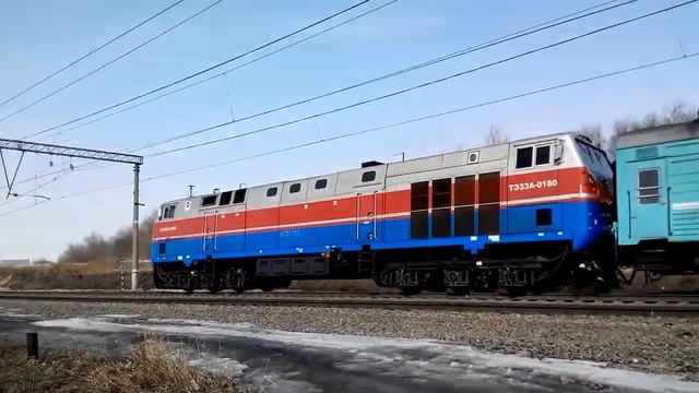 Тепловоз ТЭ33А-0180 с поездом № 39 Астана - Санкт-Петербург смотреть онлайн