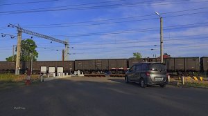 RailWay. Double freight train at a railway crossing / Сдвоенный грузовой поезд проходит жд переезд