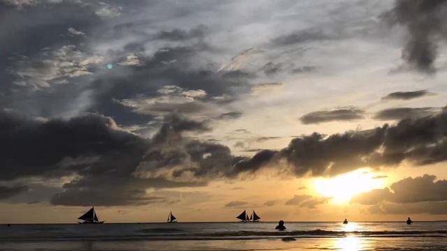 Sunset on the White sand beach. Borakay island.Philippines. смотреть онлайн
