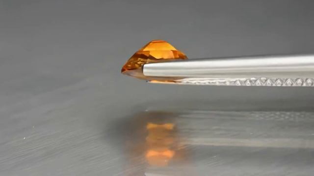 Натуральный оранжевый Турмалин Дравит овал 6.2x5.2мм 0.66ct смотреть онлайн