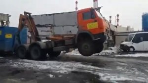 Камаз (Мультилифт) погрузка контейнера 27м3