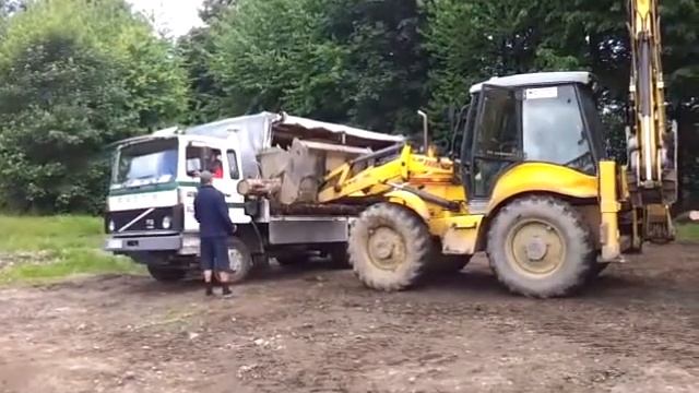 New Holland LB 115.b смотреть онлайн